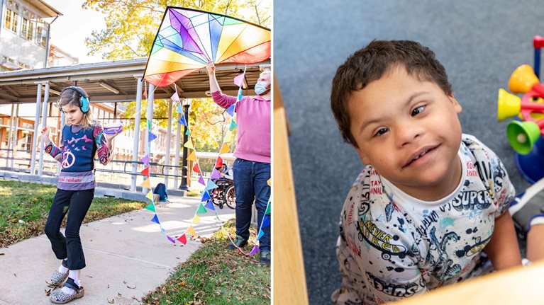 A girl flies a rainbow kite; A toddler looks up smiling